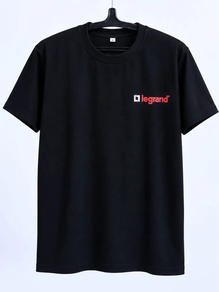 The black Legrand t-shirt on a hanger, front: the logo printed small at the left chest.